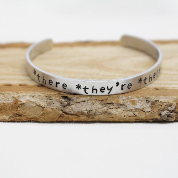 *There *They're *Their - Hand Stamped Anodized Aluminum Bangle - Adjustable - Picture 8 of 14
